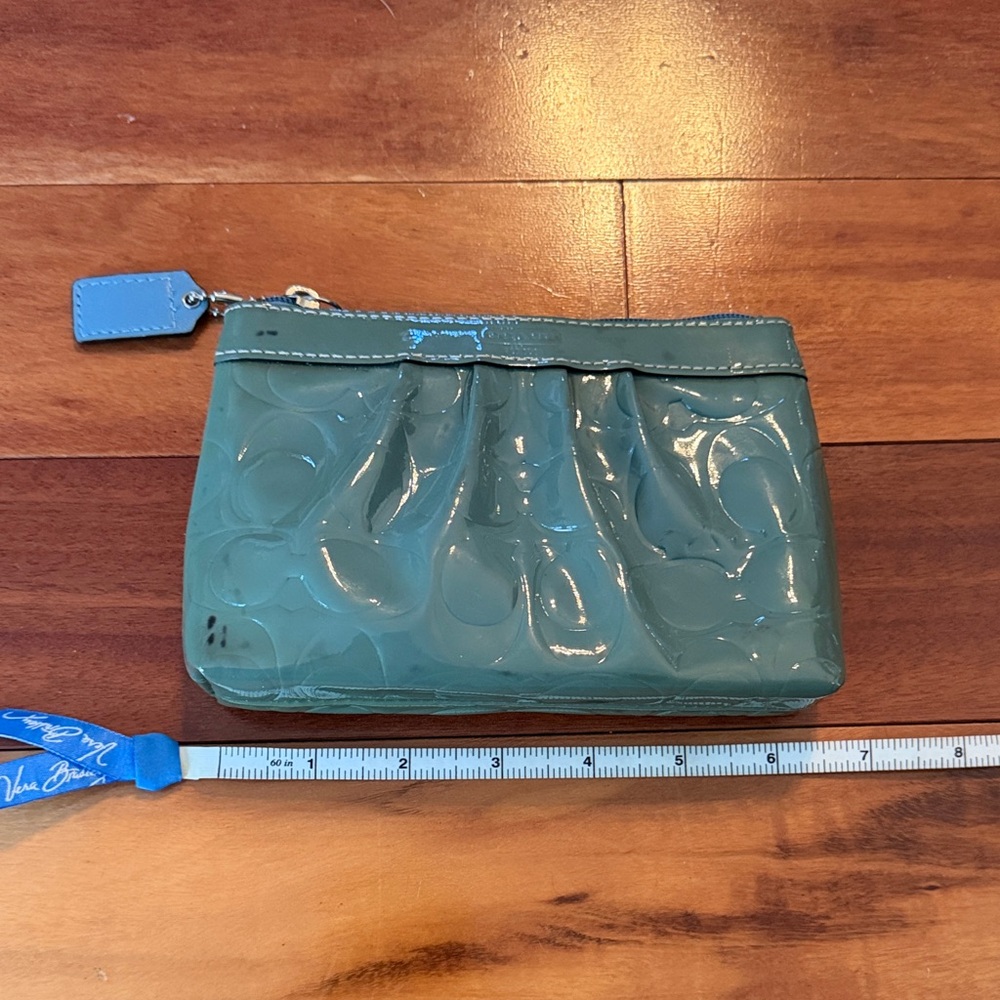 Teal Embossed Coach Wristlet